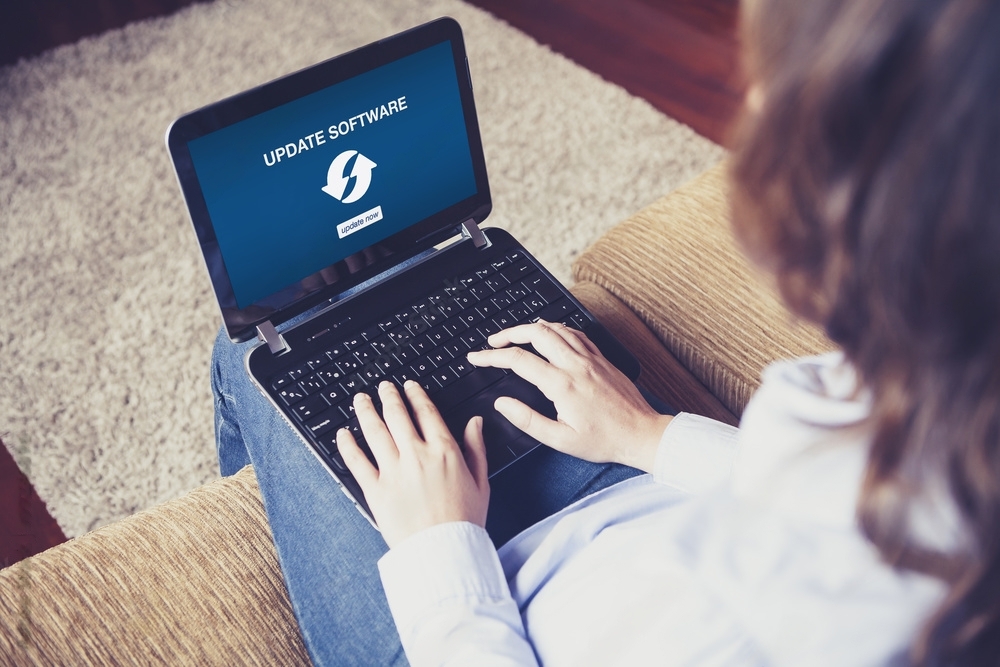 woman typing on computer