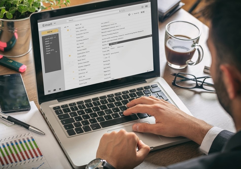 person writing an email