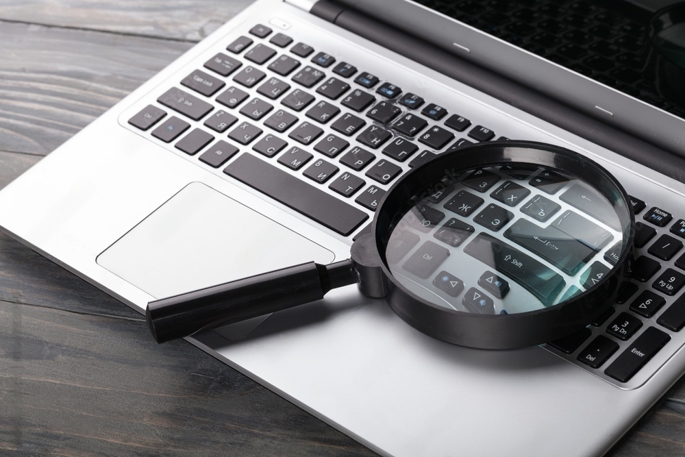 magnifying glass on computer