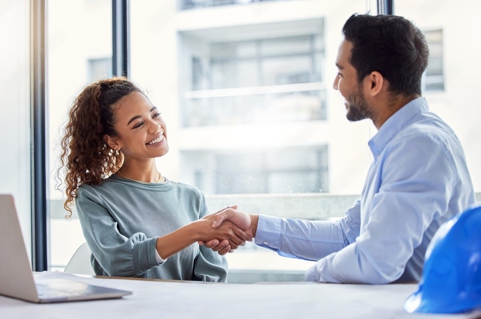 two people shaking hands