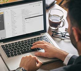 a guy using a laptop